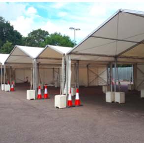 Marquees set-up at Newmarket Road park and ride in Cambridge to provide drive through blood tests