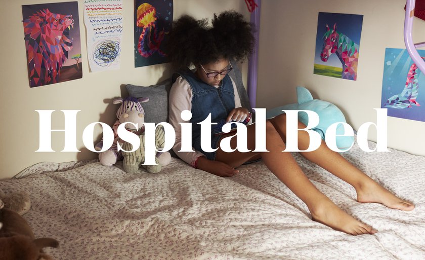 A subversive image showing a child on her bed at home overlaid with the words Hospital Bed
