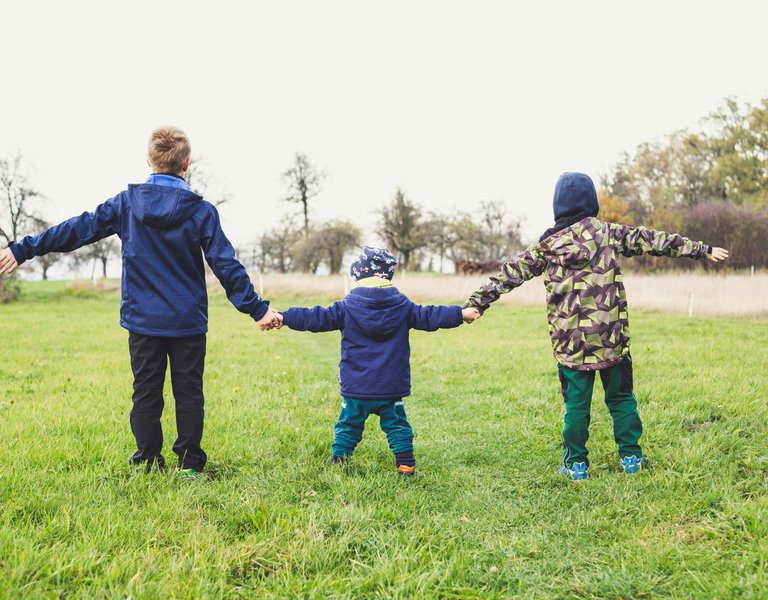 Children holding hands